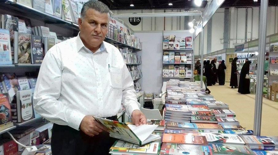 Director of the university library Mr. Hasan Al-Said in Abu Dhabi International book fair 