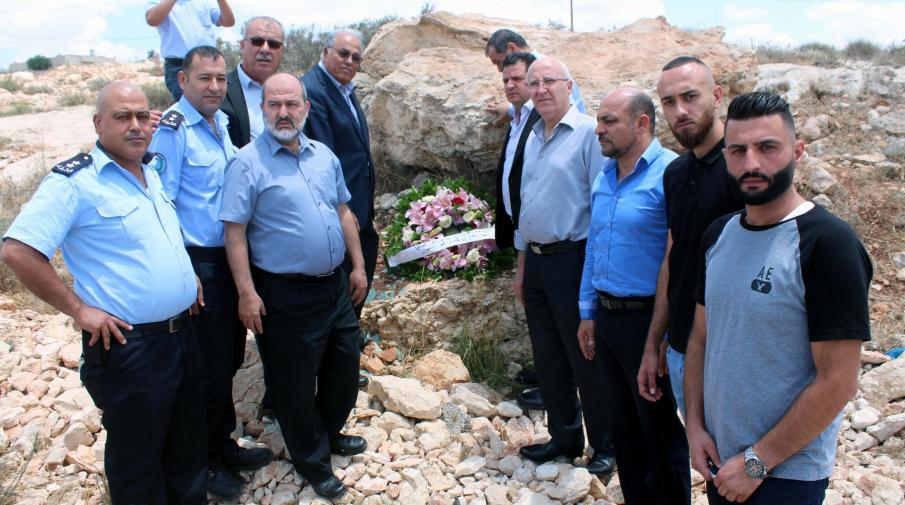 Placing the wreath on behalf of the university at the incident place