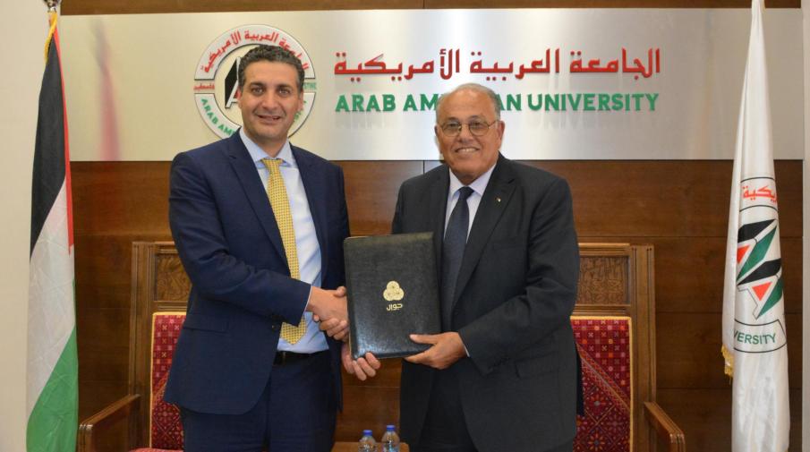 Prof. Ali Zeidan Abu Zuhri- the University President and Mr. Abdul Majeed Melhem- the General Manager of PALTEL “Jawwal”