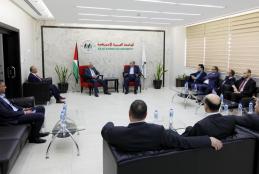 University President Prof. Dr. Ali Zeidan Abu Zuhri welcoming the President of Land and Water Settlement Authority Minister Judge Mousa Shakarneh